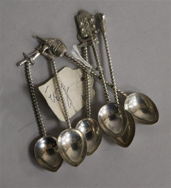Six assorted continental white metal spoons.